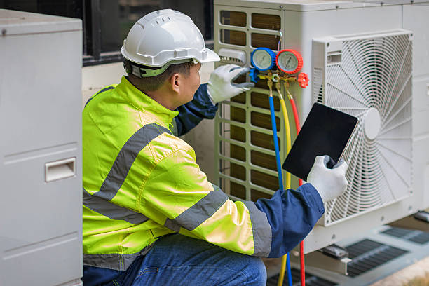 Professional Hvac technician working in Frederick, MD